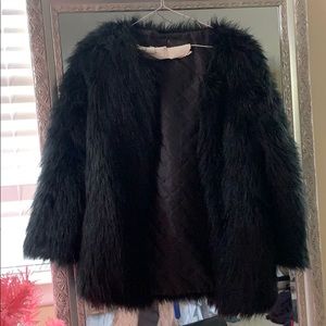 Black faux fur coat
